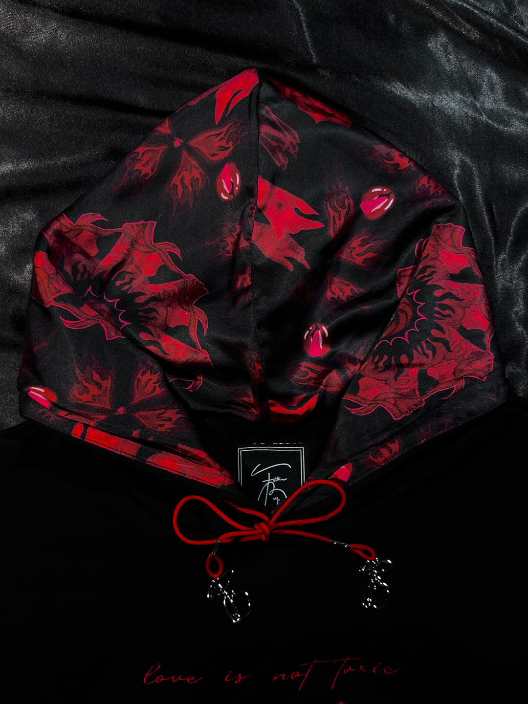 "LOVE IS NOT TOXIC" HOODIE, Winter Vault, 2026.
